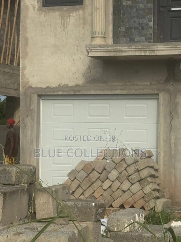 Double Automated Garage Door · Photo 2
