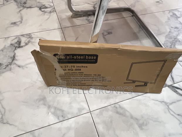 Universal Mount Metal Tv Stand Holder W/Hollow Vertical Tube · Photo 1