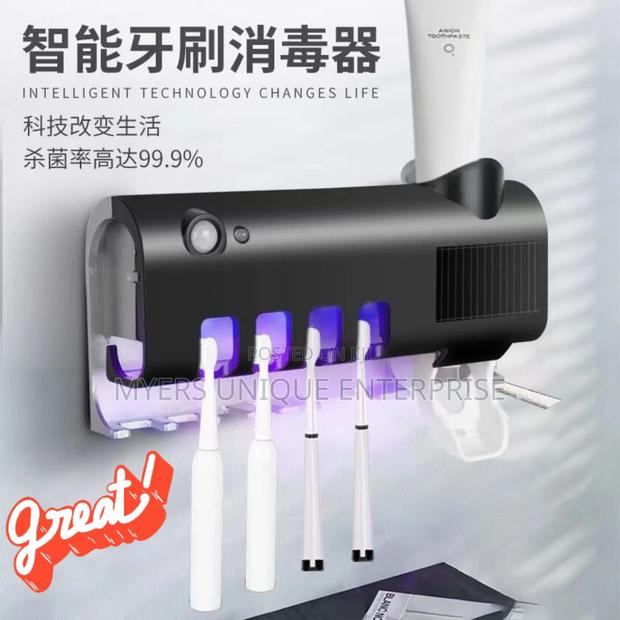 Wall Mounted Toothbrush Sterilizer for Whole Family · Photo 1