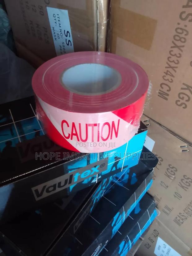 Caution Tape - Red & White - With Caution Label Inside. · Photo 2