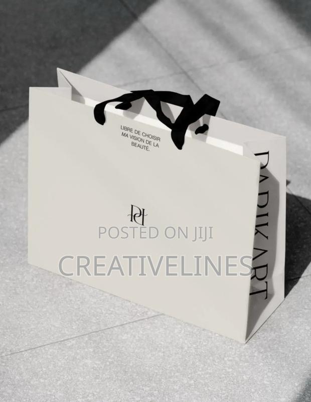 White and Black Paper Bag · Photo 1