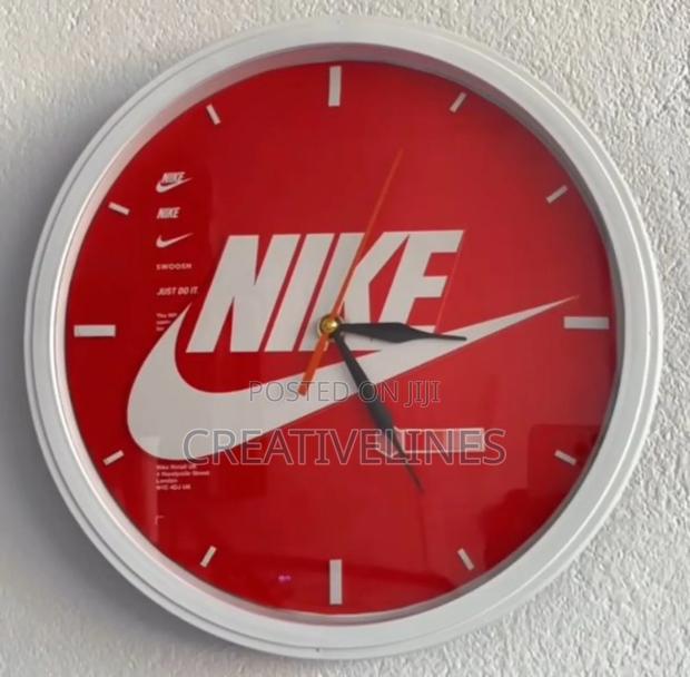 Reddish Branded Clock · Photo 1