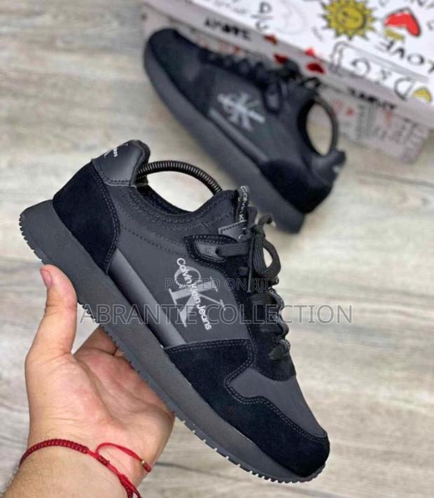 Authentic Calvin Klein Black Sneaker · Photo 1