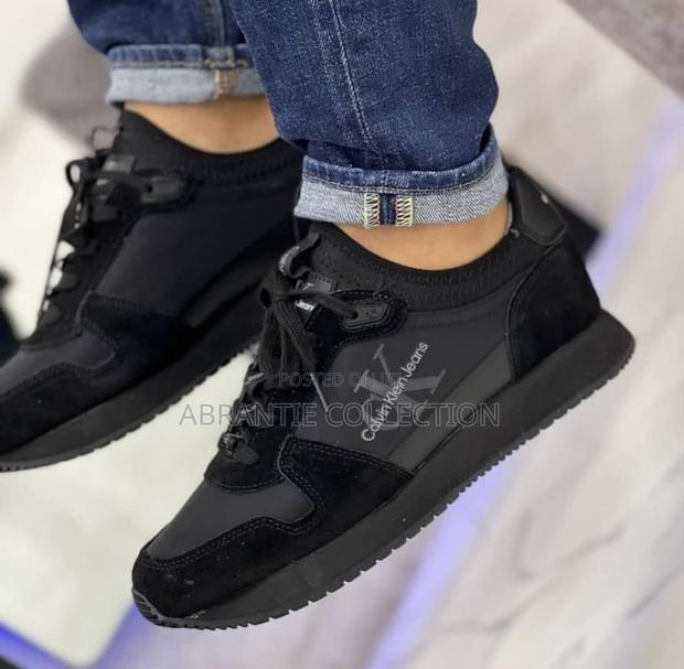 Authentic Calvin Klein Black Sneaker · Photo 2