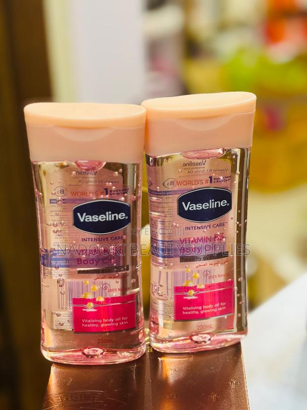 Vaseline Cocoa Radiant Body Oil + Vitamin B3 Body Oil · Photo 1