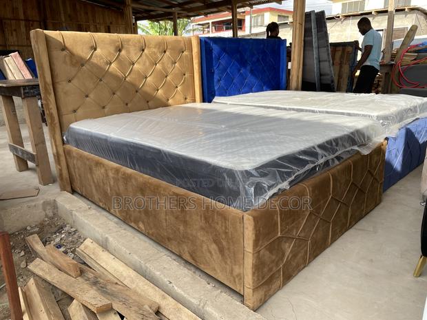 Double Bedframe 54x75 Brown In Color With Mattress · Photo 1