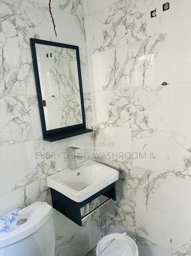 Small Wash Hand Basin With Mirror_ Mini Cabinet Basin · Photo 1