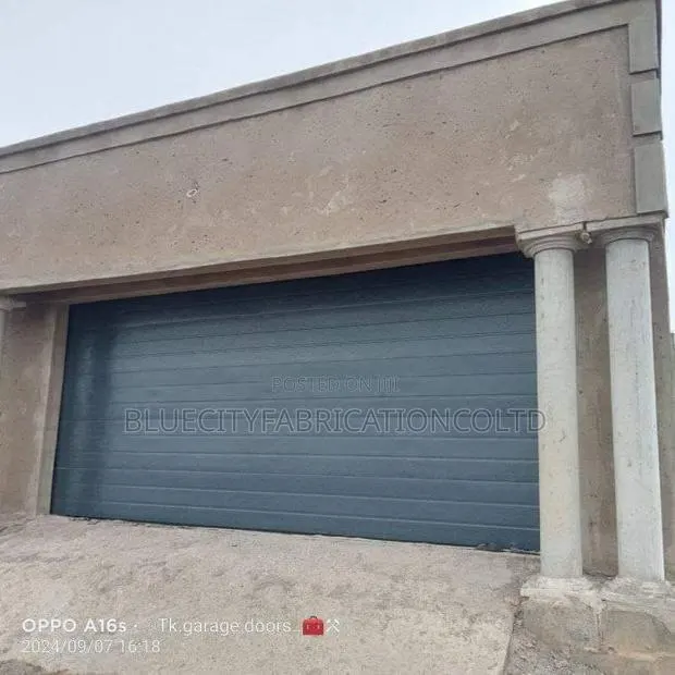 A+ Automatic Garage Door System 18ft X 8ft · Photo 1