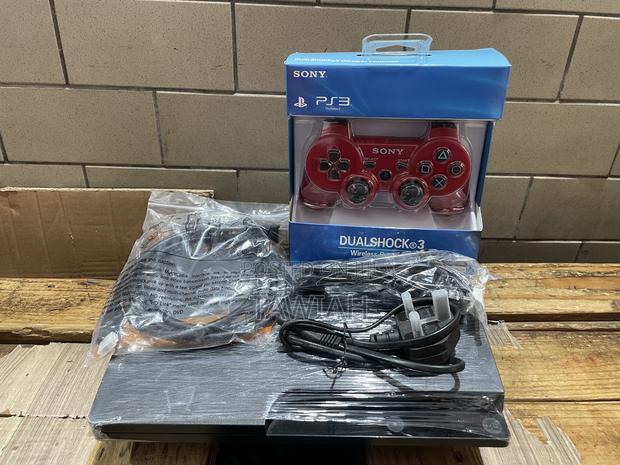 Ps3 Console With Games · Photo 1