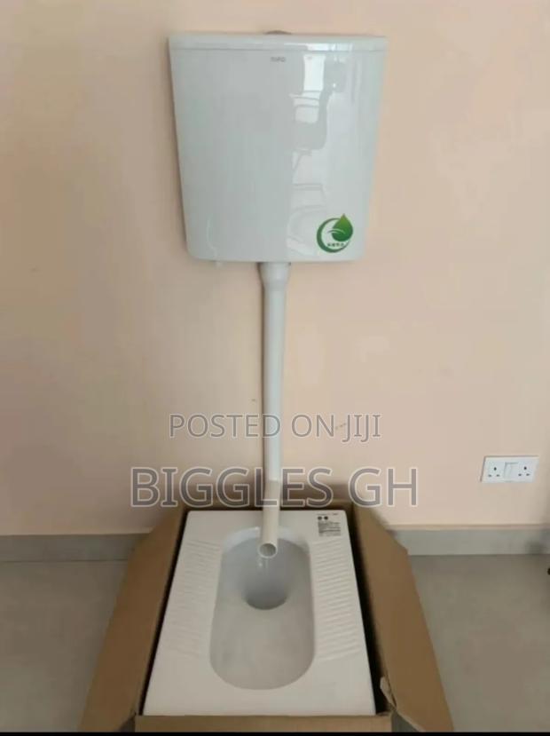 Squatting Wc With Water Tank · Photo 1