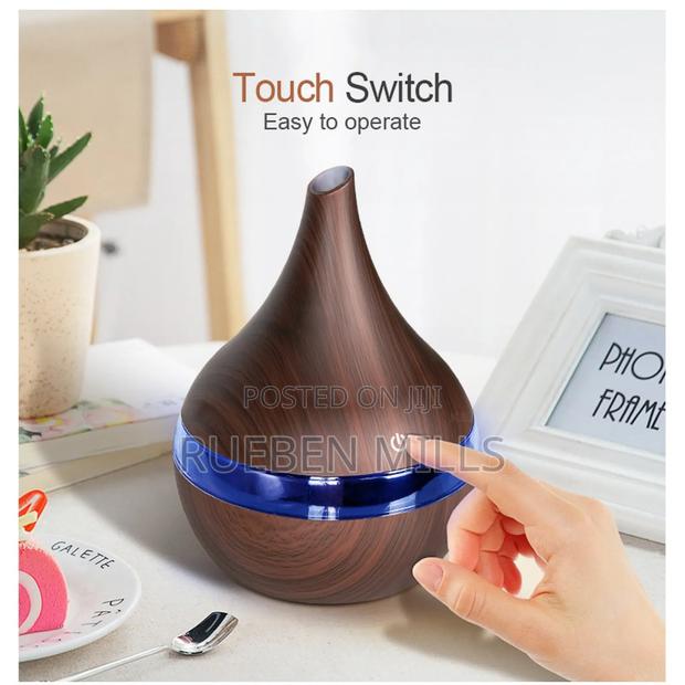 Natural Wood Grain Aroma Diffuser Air Humidifier · Photo 1