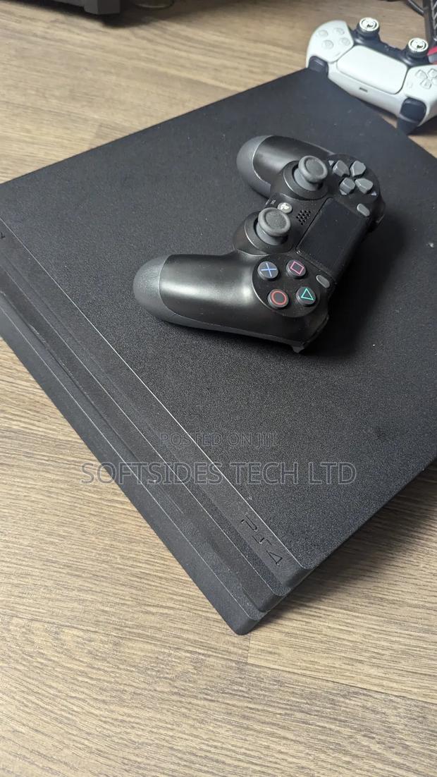 Buy Playstation 4 Pro With Graphics With 15 Games Ready · Photo 1