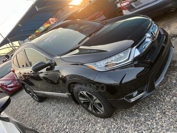 Honda CR-V Touring AWD 2019 White · Photo 1