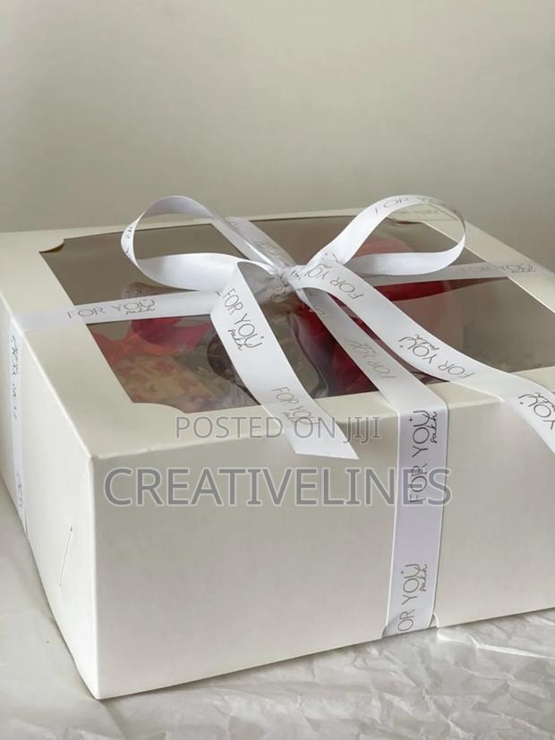 White Cake Boxes With Ribbons · Photo 1