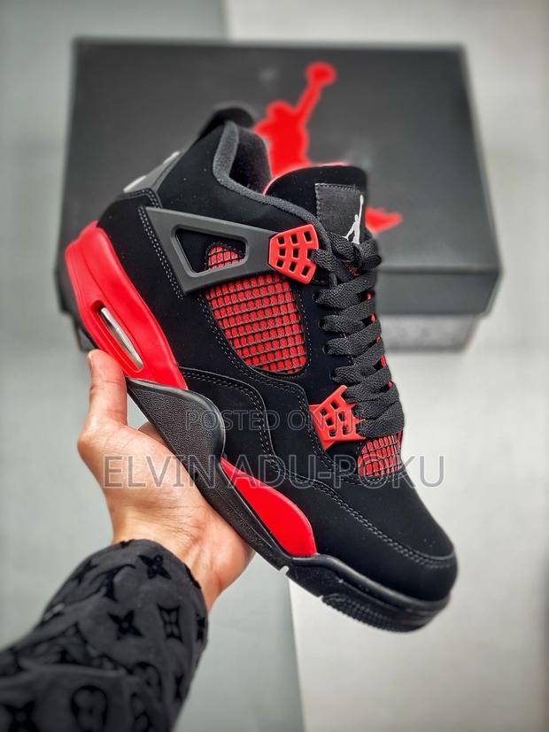 Air Jordan 4 Retro “ Red Thunder” · Photo 2