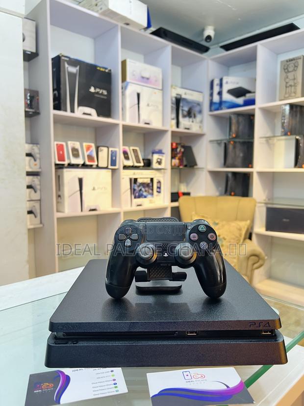 Fairly Used Ps4 With 6 Latest Games · Photo 1