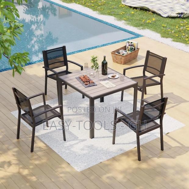 Outdoor Dining Set Chairs and a Metal Square Table · Photo 3