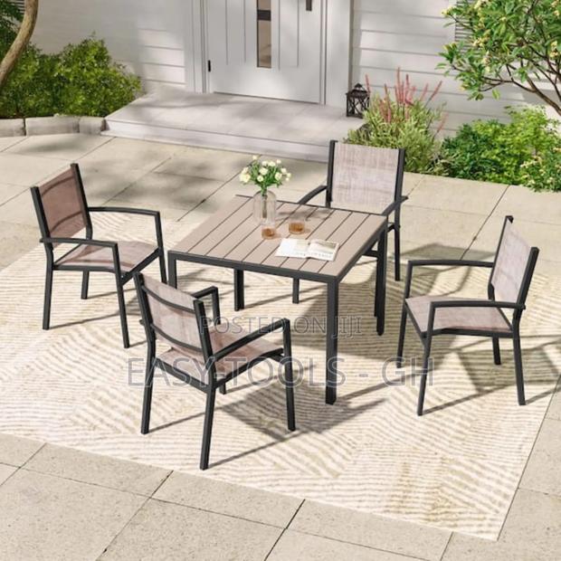 Outdoor Dining Set Chairs and a Metal Square Table · Photo 4