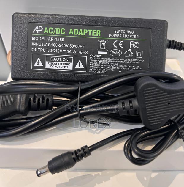 12v 5a Adapter Universal Adapter 5amps With Power Plug · Photo 1