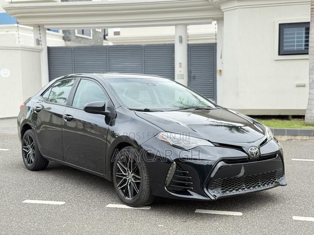 Toyota Corolla LE (1.8L 4cyl 2A) 2018 Black · Photo 3