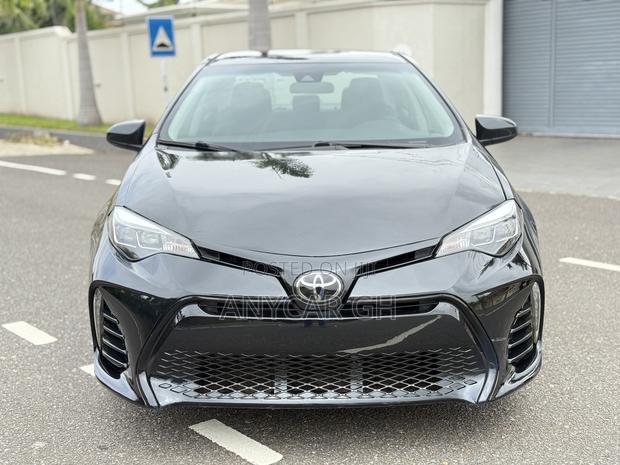Toyota Corolla LE (1.8L 4cyl 2A) 2018 Black · Photo 2