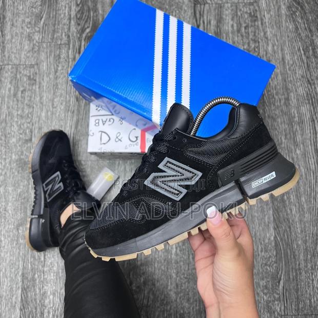 New Balance Unisex Encap Reveal “ Core Black” · Photo 1