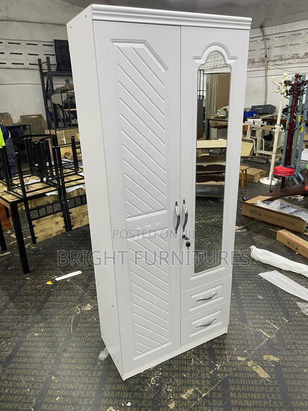 Imported Wooden 2 Doors Wardrobe With Mirror and Drawers · Photo 1