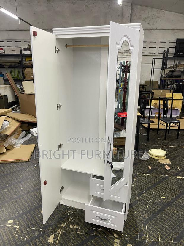 Imported Wooden 2 Doors Wardrobe With Mirror and Drawers · Photo 3