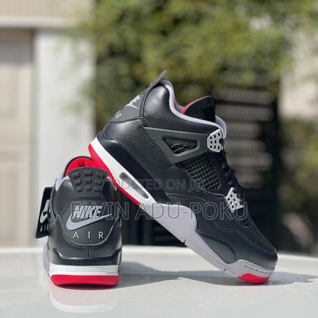 Air Jordan 4 "Bred Reimagined" Sneakers. · Photo 1