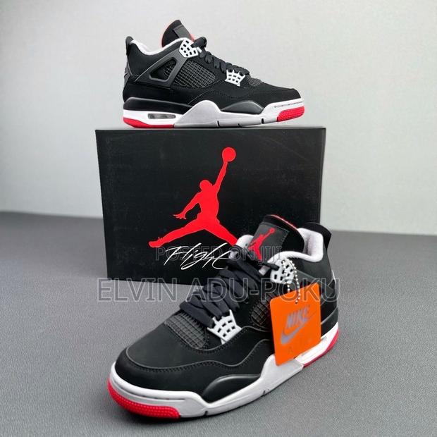 Air Jordan 4 "Bred Reimagined" Sneakers. · Photo 2