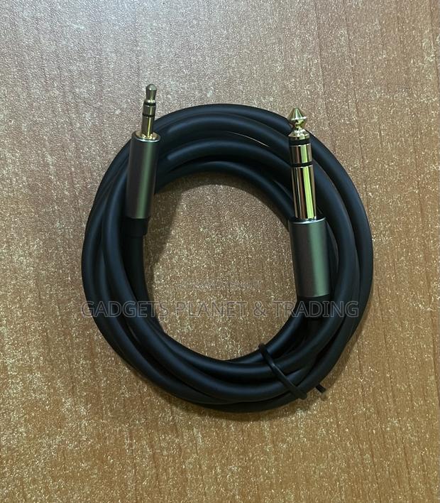 3.5mmtrs 1/8" Male to 6.35mm 1/4" Aux Cord - 1.5m · Photo 2