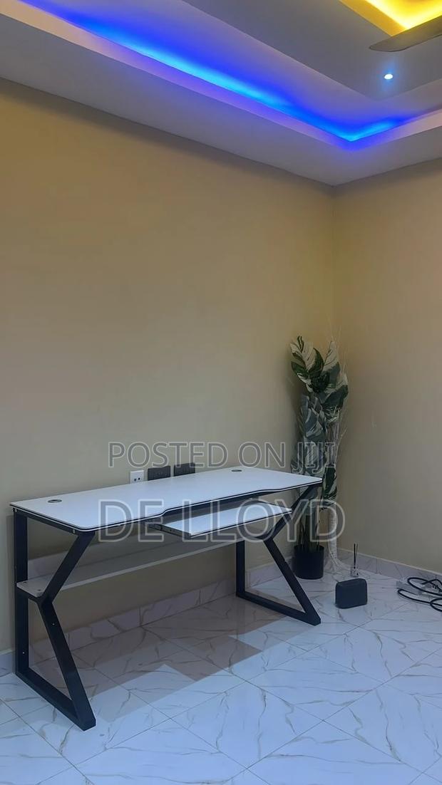 Multipurpose Table With Shelves And Keyboard Desk · Photo 4