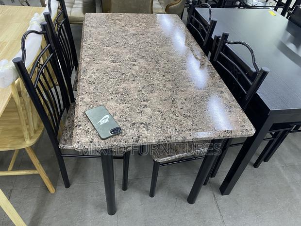 Wooden Dining Sets With Metal Frame · Photo 1