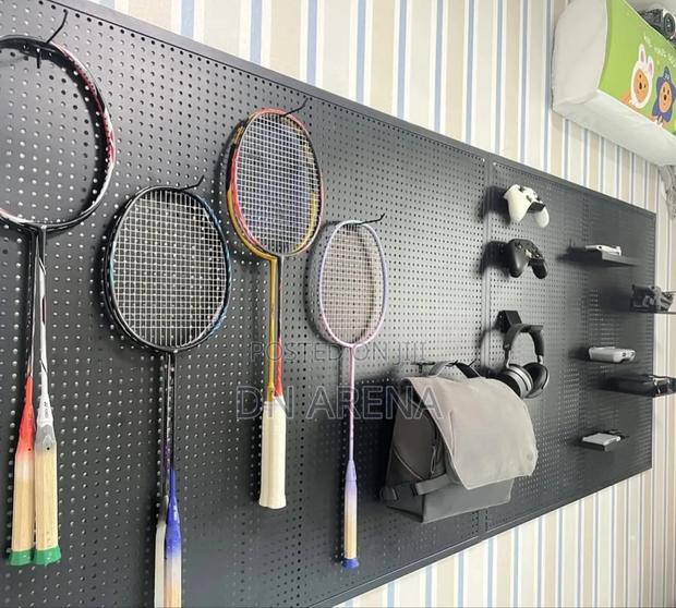 Black Metallic Pegboard With Hooks Perforated Board · Photo 2