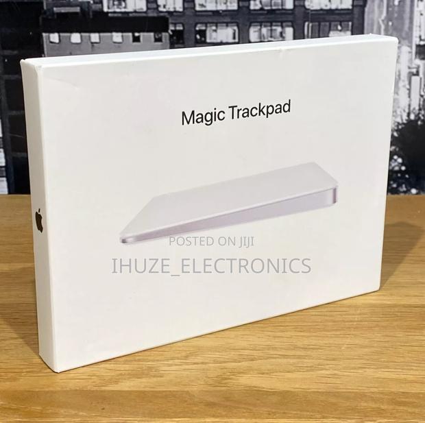 Latest Magic Trackpad (Usb‐C) - White Multi-Touch Surface · Photo 1