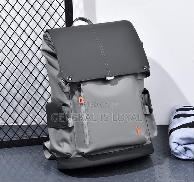 Backpack Waterproof And Anti Dust · Photo 6