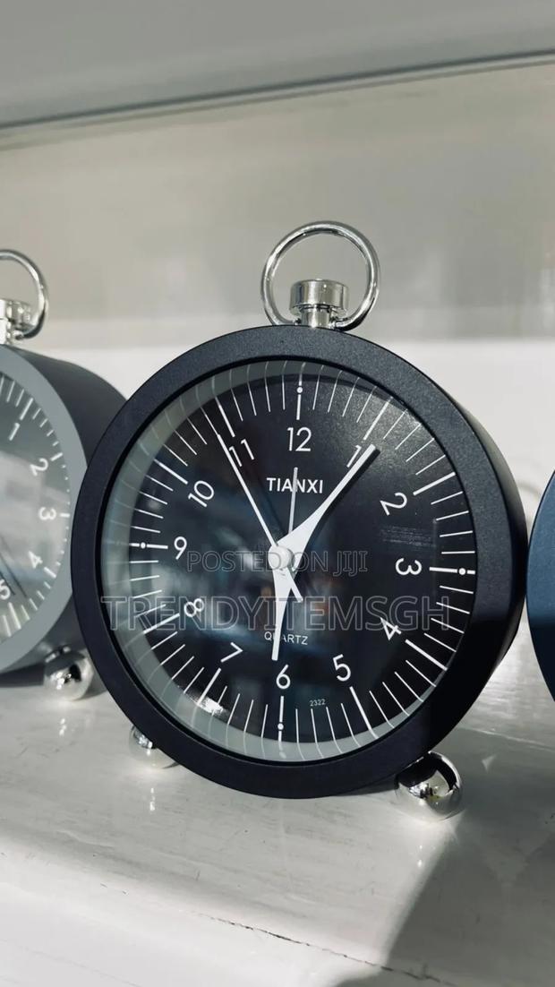 Pendulum Alarm Clock · Photo 2