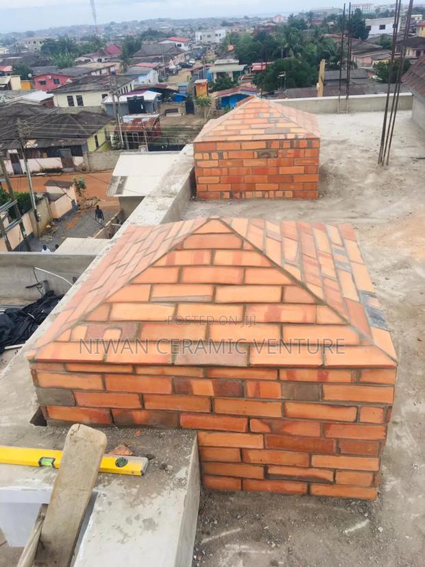Burnt Brick Tiles Fencing · Photo 2