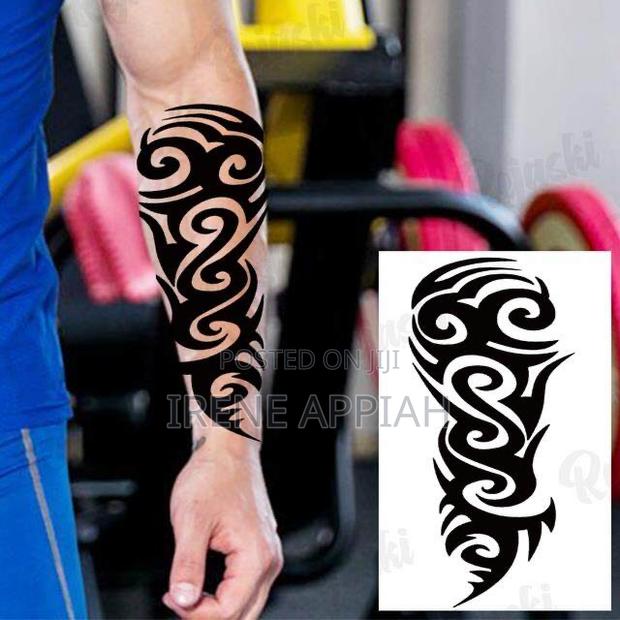Short Sleeve Tatts · Photo 2