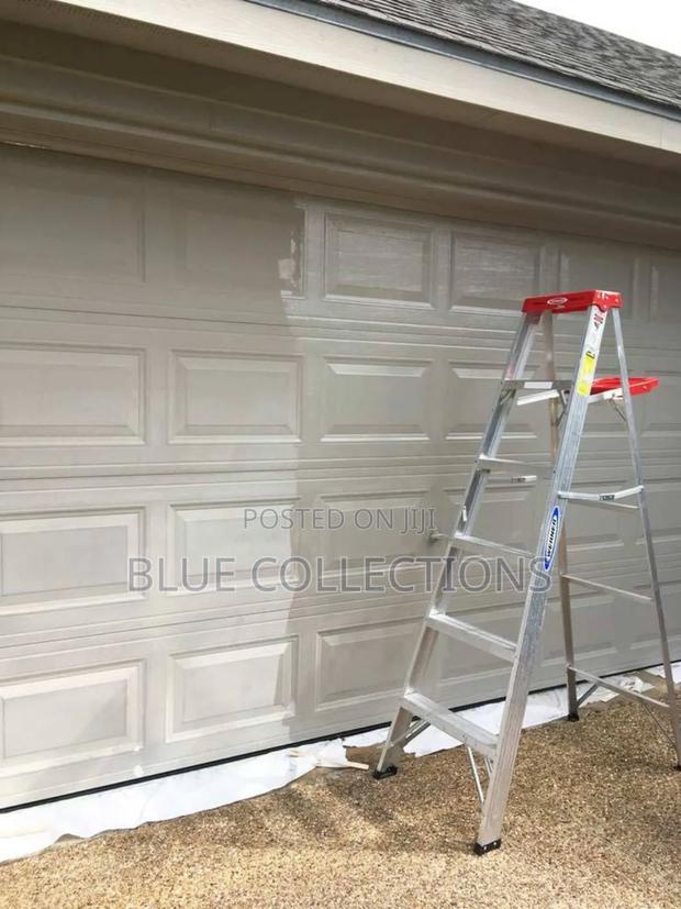 Smart Garage Door With Fanlight · Photo 1