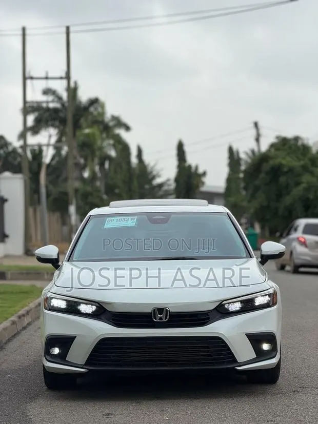 Honda Civic Touring CVT 2024 White · Photo 1