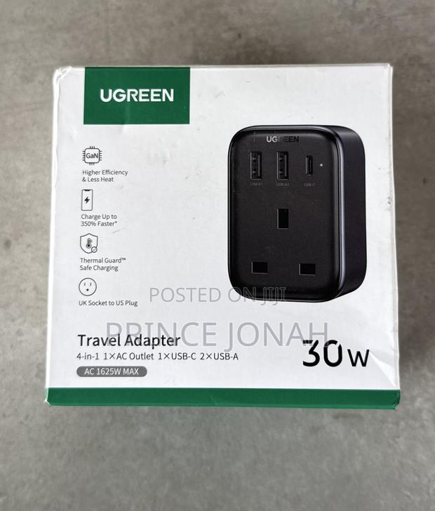 Ugreen Travel Adapter - Usa to Uk With 2 Usb and Type C · Photo 1