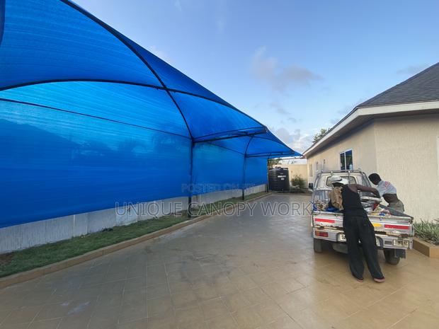 Usual Carport · Photo 1