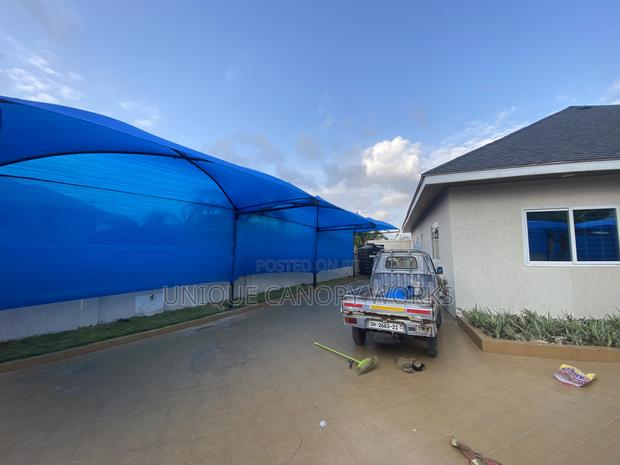 Usual Carport · Photo 3