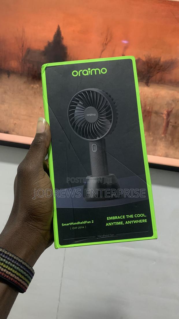 Oraimo Smart Handheld Fan 2 With Light Base · Photo 1