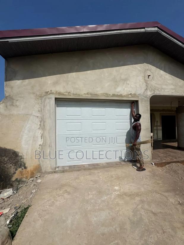Garage Door With Motor and Remote · Photo 2