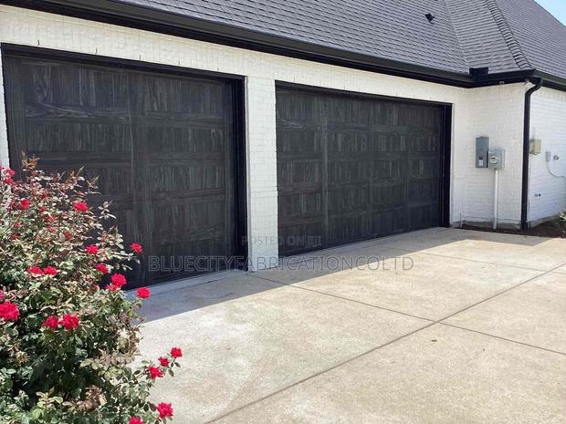 Aaa Plus Imported Automated Garage Door System With Remote · Photo 2