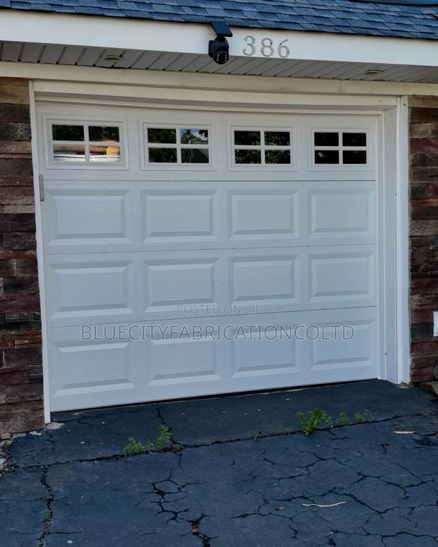 Aaa Plus Imported Automated Garage Door System With Remote · Photo 3