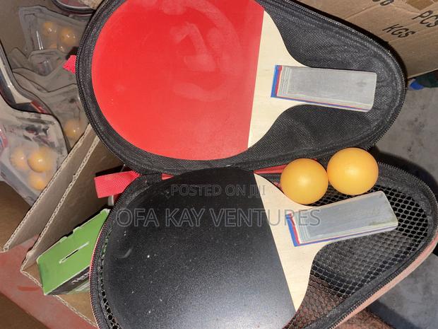 Tennis Ball With Bat · Photo 1