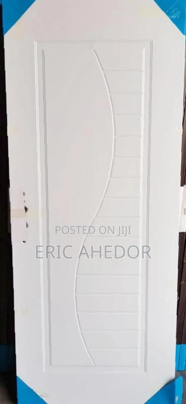 White Bedroom Security Door With Metal Frames and Handles · Photo 1
